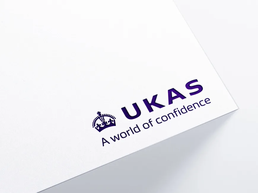 UKAS logo on corner of white paper