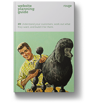 front cover of a book showing a man shaving a black poodles legs