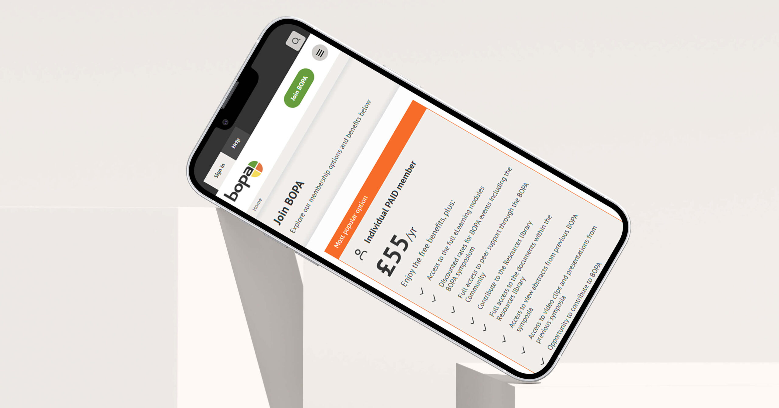 Mobile phone on a podium showing the subscription package for BOPA.