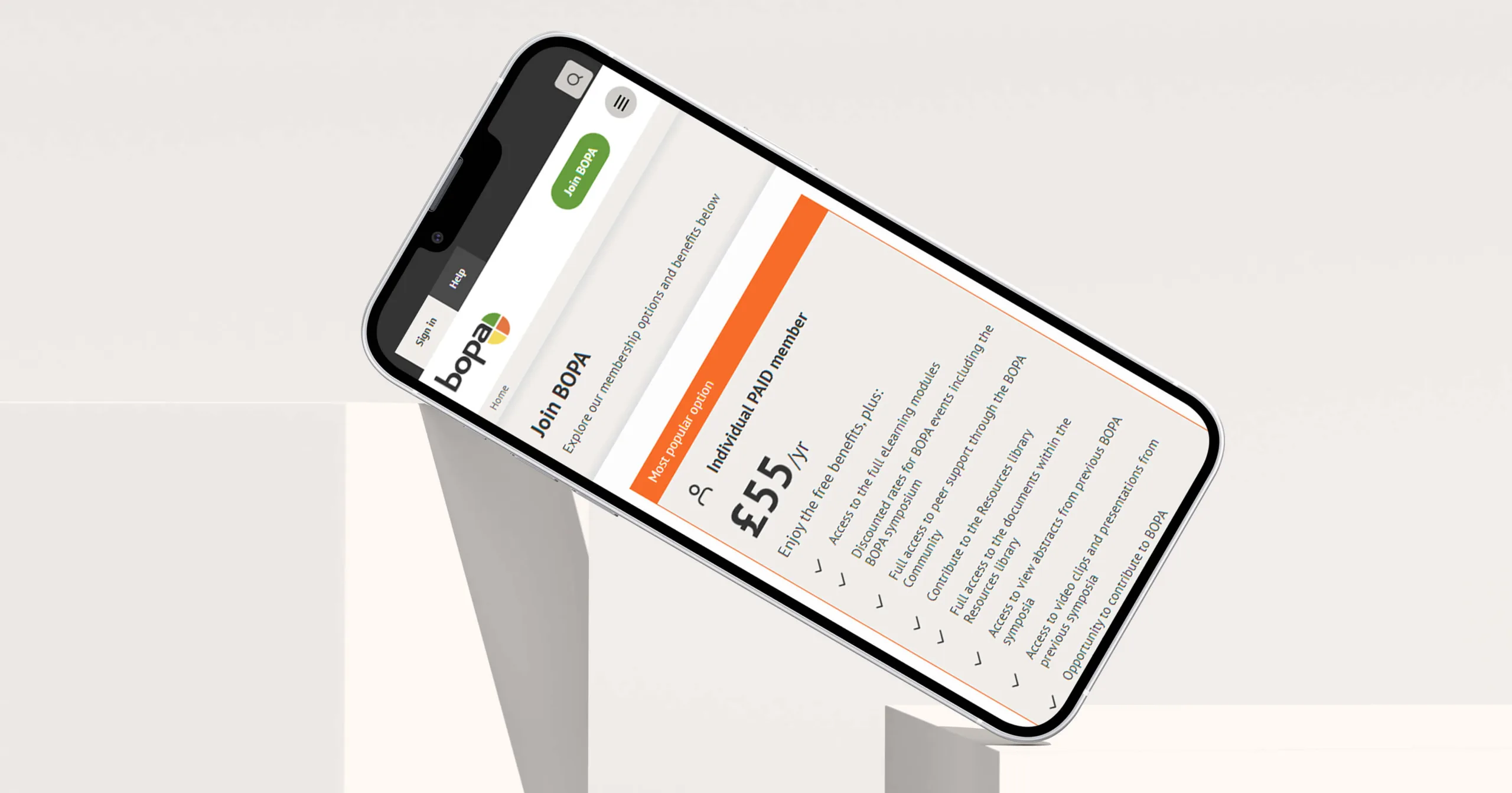 Mobile phone on a podium showing the subscription package for BOPA.