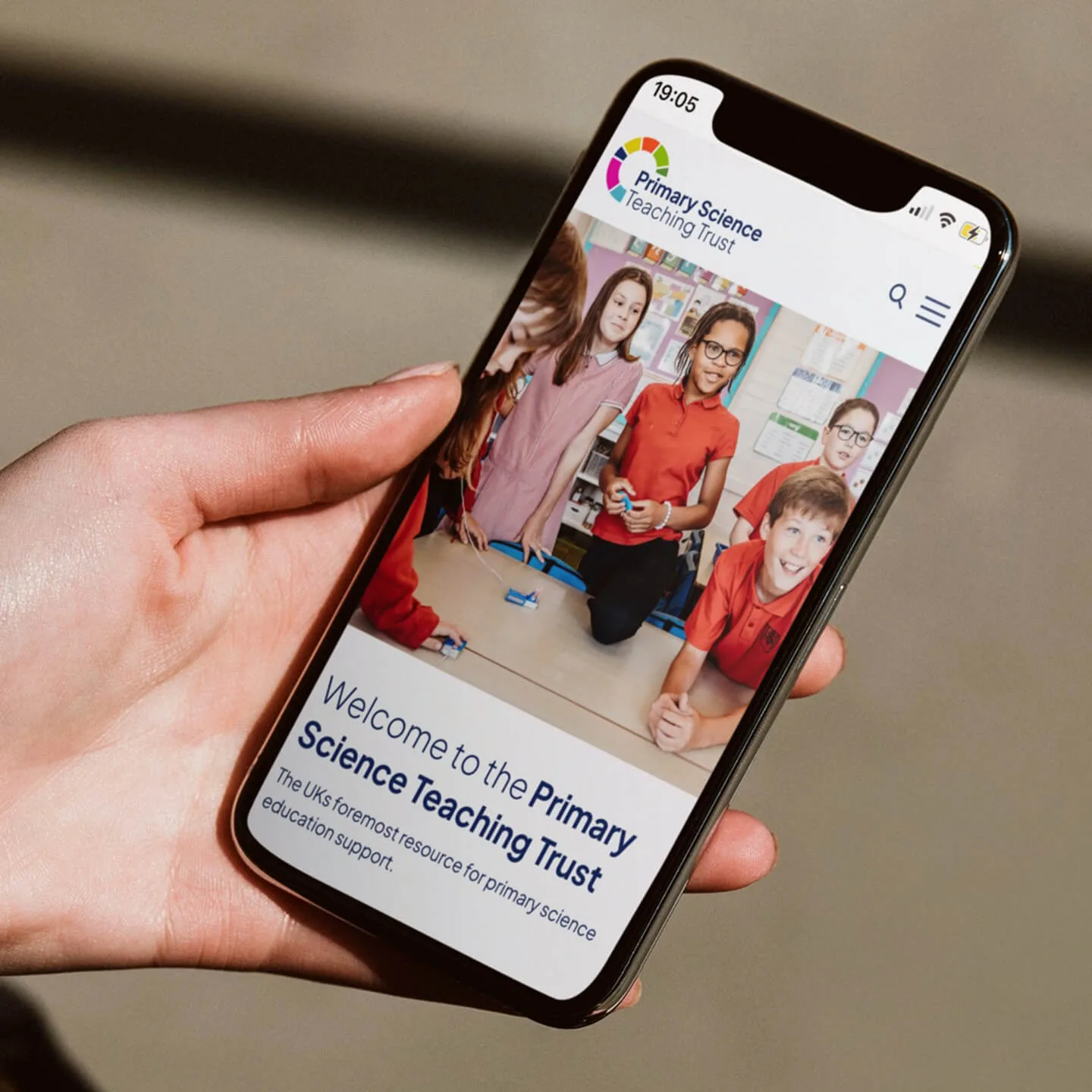 Hand holding a mobile phone