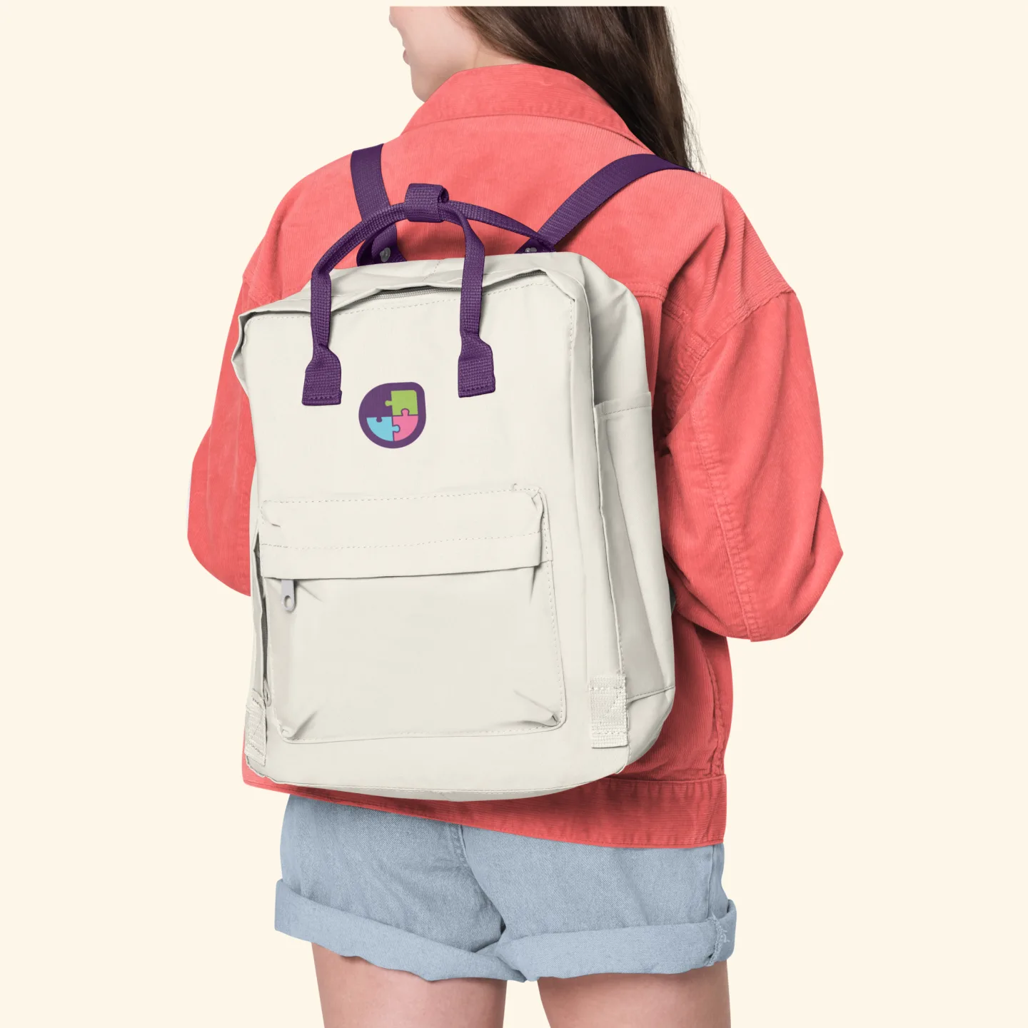 A student with a Jigsaw branded bag